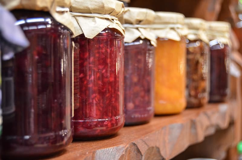 comparative advantage jam and jelly jars on a shelf